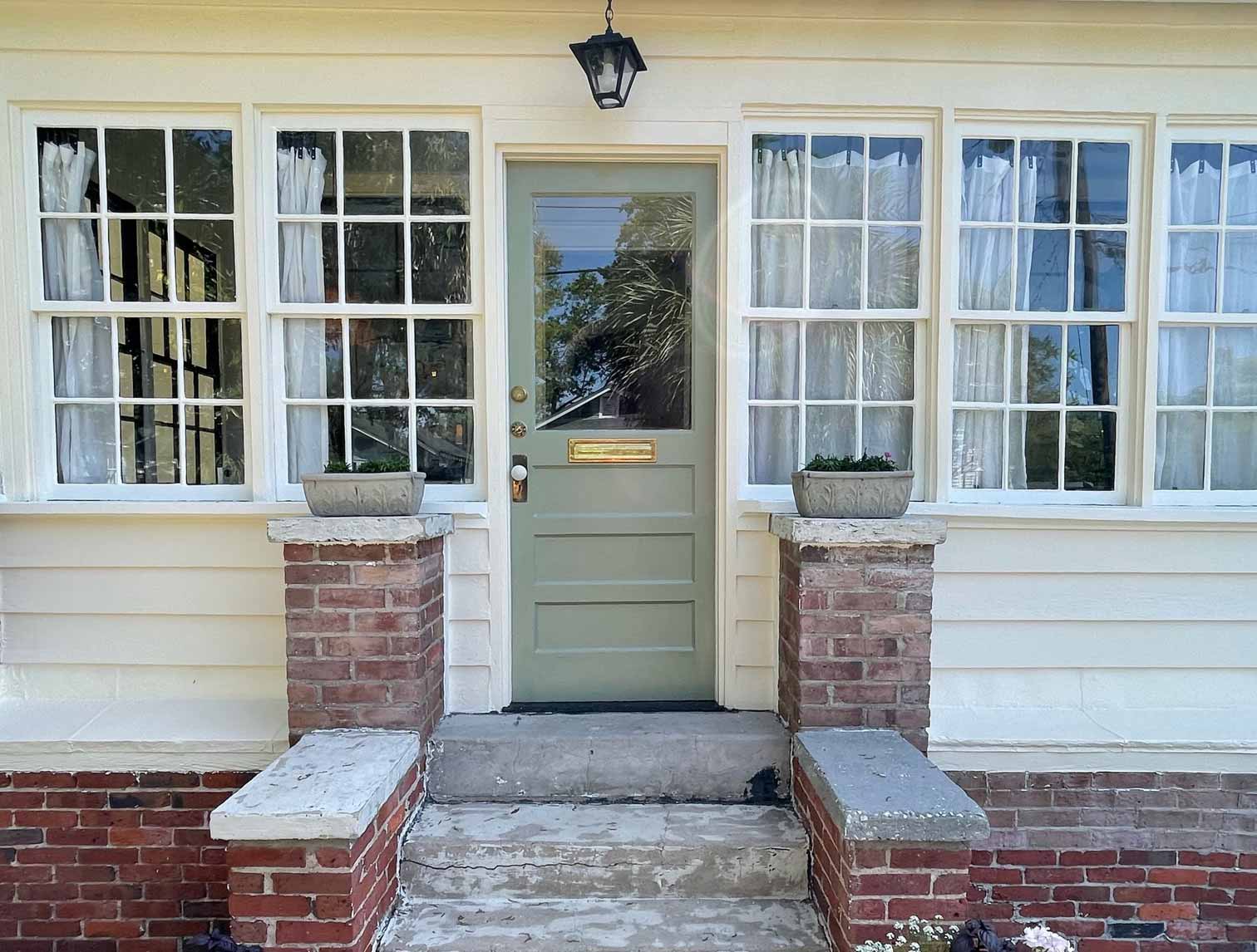 house with wood rot repaired and freshly painted